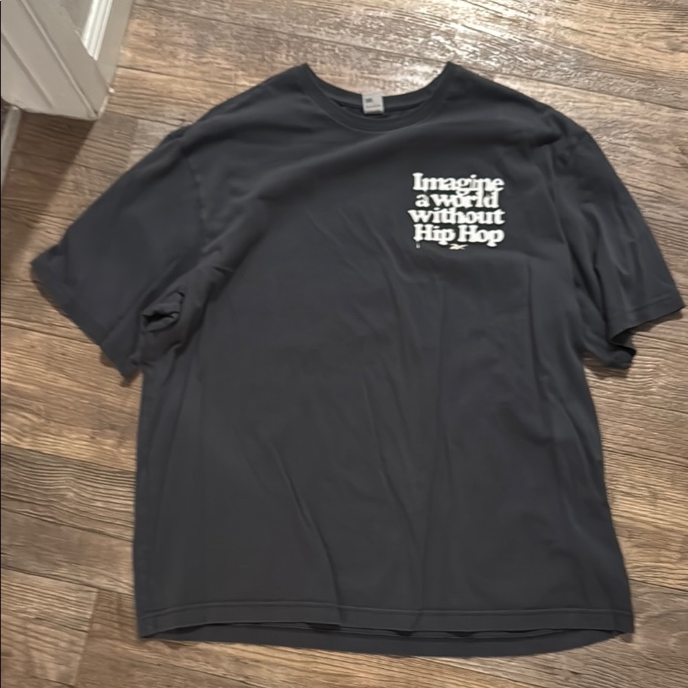 Black Reebok Short Sleeve Tee celebrating 50 years of hip hop